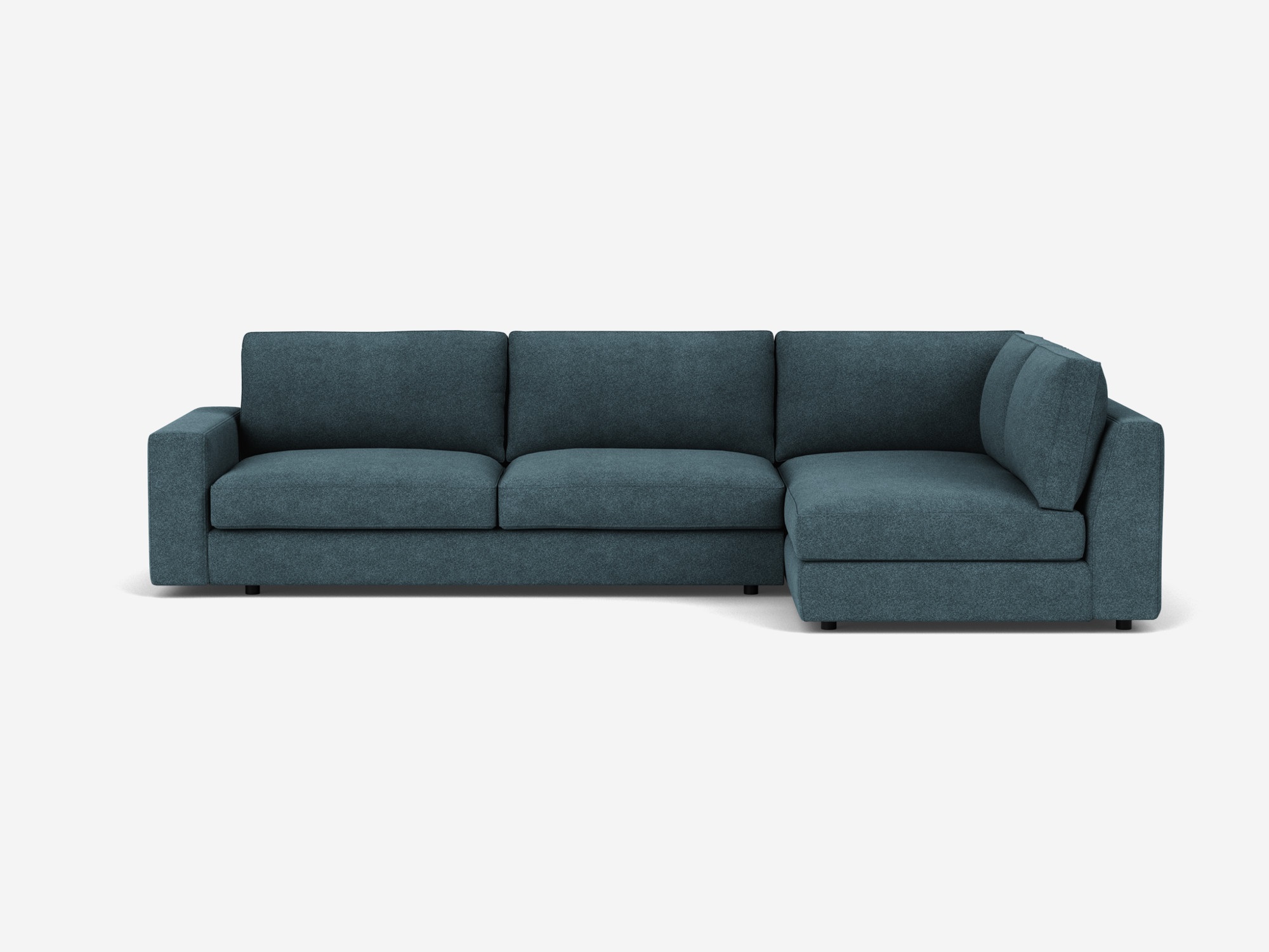 Front view of the Cello modular sofa in blue fabric with right hand chaise